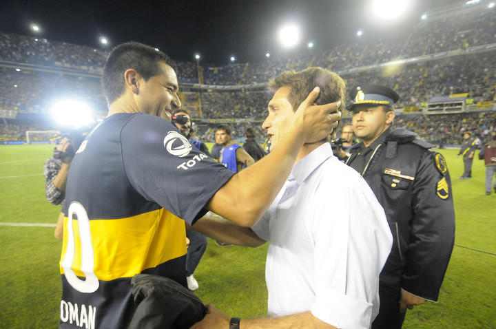 Juan Román Riquelme y Guillermo Barros Schelotto en 2013. Foto: DyN